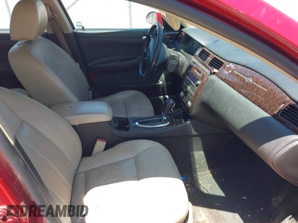 2013 Chevrolet Impala LTZ with VIN 2G1WC5E35D1175879, listed as a IAAI auction lot 42143602 with 156,385 mi miles and . Bid and sale history available at DreamBid. Image 5.
