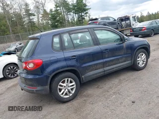 2011 Volkswagen Tiguan SE with VIN WVGBV7AX3BW511017, listed as a IAAI auction lot 42222868 with 120,955 mi miles and . Bid and sale history available at DreamBid. Image 4.