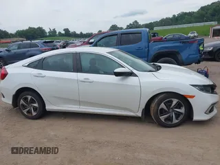 2020 Honda Civic LX z VIN 19XFC2F66LE021813, wystawiony jako IAAI lot #42285033 z przebiegiem 116 069 mil mil oraz . Historia ofert i sprzedaży dostępna na DreamBid. Obrazek 13.