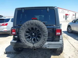 2020 Jeep Wrangler Unlimited Sport S z VIN 1C4HJXDN9LW323205, wystawiony jako IAAI lot #41879292 z przebiegiem 108 499 mil mil oraz . Historia ofert i sprzedaży dostępna na DreamBid. Obrazek 16.