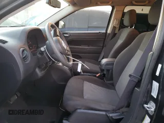 2016 Jeep Compass Sport with VIN 1C4NJCBB3GD574632, listed as a Copart auction lot 88016225 with 93,138 mi miles and Salvage title. Bid and sale history available at DreamBid. Image 7.