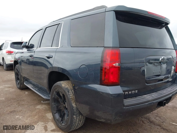 2020 Chevrolet Tahoe LT with VIN 1GNSKBKC3LR306946, listed as a IAAI auction lot 41570785 with 56,603 mi miles. Bid and sale history available at carsss.com. Image 3.