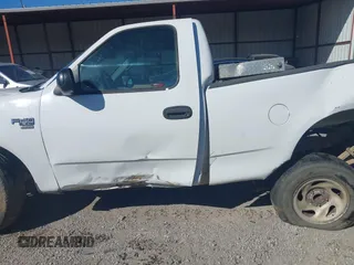 2003 Ford F-150 XL with VIN 2FTRF17W03CA59388, listed as a IAAI auction lot 41673651 with 221,668 mi miles. Bid and sale history available at carsss.com. Image 15.