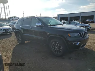 2018 Jeep Grand Cherokee Limited with VIN 1C4RJFBG0JC298468, listed as a Copart auction lot 82975214 with 57,499 mi miles and Salvage Title. Bid and sale history available at carsss.com. Image 4.