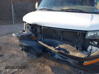 2018 Chevrolet Express Cargo Van with VIN 1GCWGAFG4J1338478, listed as a IAAI auction lot 41588218 with 88,990 mi miles. Bid and sale history available at carsss.com. Image 6.