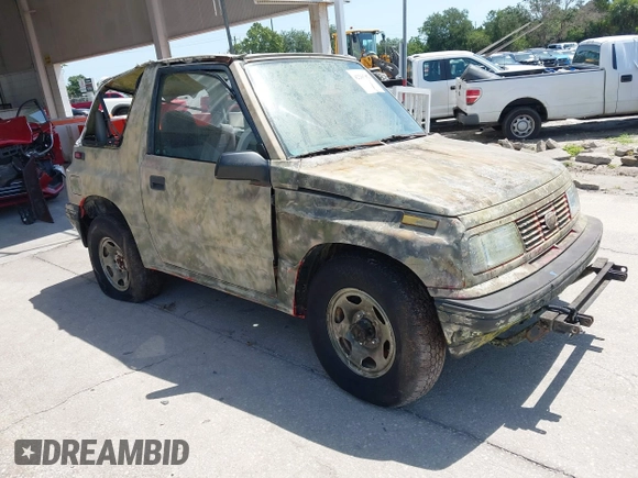 1995 Chevrolet Tracker z VIN 2CNBJ1869S6911342, wystawiony jako IAAI lot #42265392 z przebiegiem 121 944 mil mil oraz . Historia ofert i sprzedaży dostępna na DreamBid. Obrazek 1.