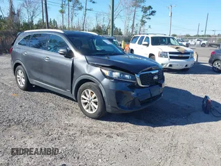 2019 Kia Sorento LX with VIN 5XYPGDA3XKG436510, listed as a IAAI auction lot 41010237 with 123,368 mi miles and . Bid and sale history available at carsss.com. Image 1.