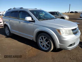 2012 Dodge Journey SXT with VIN 3C4PDCCG7CT135822, listed as a Copart auction lot 48820205 with 253,183 mi miles and Clean title. Bid and sale history available at DreamBid. Image 4.