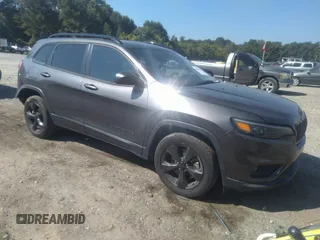 2020 Jeep Cherokee Latitude Plus with VIN 1C4PJLLB7LD581696, listed as a IAAI auction lot 40094839 with 55,576 mi miles. Bid and sale history available at carsss.com. Image 1.