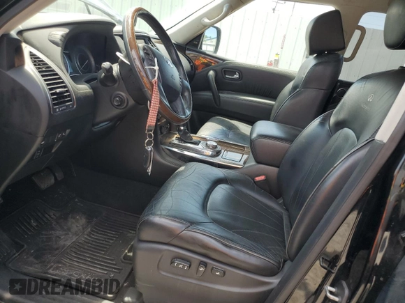 2014 Infiniti QX80 with VIN JN8AZ2NE6E9064366, listed as a Copart auction lot 62819525 with 137,817 mi miles and Salvage title. Bid and sale history available at DreamBid. Image 7.