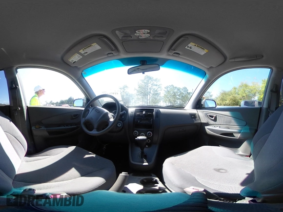 2006 Hyundai Tucson GL with VIN KM8JM12BX6U249982, listed as a IAAI auction lot 41976033 with 107,153 mi miles. Bid and sale history available at carsss.com. Image 19.