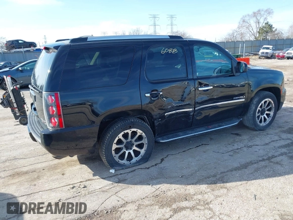 2013 GMC Yukon Denali with VIN 1GKS2EEF7DR347893, listed as a IAAI auction lot 41856088 with 126,213 mi miles. Bid and sale history available at carsss.com. Image 4.