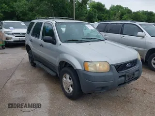 2003 Ford Escape XLS Popular with VIN 1FMYU02123KA32790, listed as a IAAI auction lot 42122524 with 244,560 mi miles and . Bid and sale history available at DreamBid. Image 1.