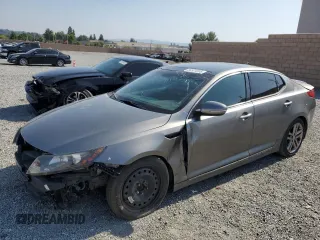 2013 Kia Optima SX z VIN 5XXGR4A60DG111988, wystawiony jako Copart lot #56521895 z przebiegiem 128 134 mil mil oraz Szkoda całkowita • Salvage title. Historia ofert i sprzedaży dostępna na DreamBid. Obrazek 1.