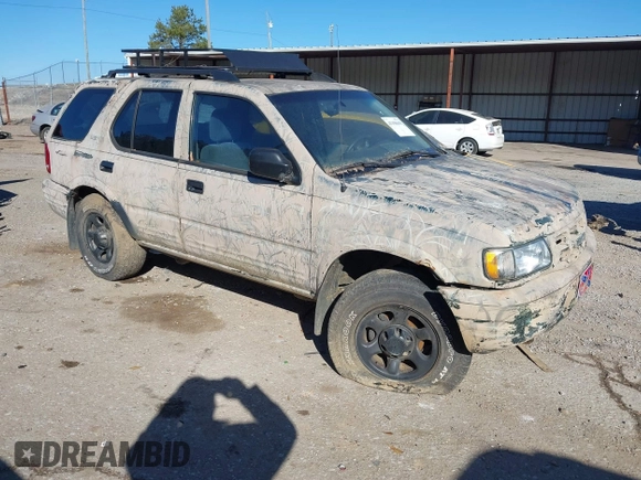 2001 Isuzu Rodeo S z VIN 4S2DM58W214322178, wystawiony jako IAAI lot #41398609 z przebiegiem 180 017 mil mil oraz . Historia ofert i sprzedaży dostępna na DreamBid. Obrazek 1.