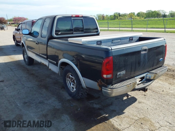 1997 Ford F-150 XL with VIN 1FTDX18W6VKD46643, listed as a IAAI auction lot 42111129 with 107,025 mi miles. Bid and sale history available at carsss.com. Image 3.