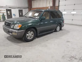 1998 Lexus LX 470 with VIN JT6HT00W3W0001352, listed as a IAAI auction lot 41882901 with 226,917 mi miles and . Bid and sale history available at DreamBid. Image 2.