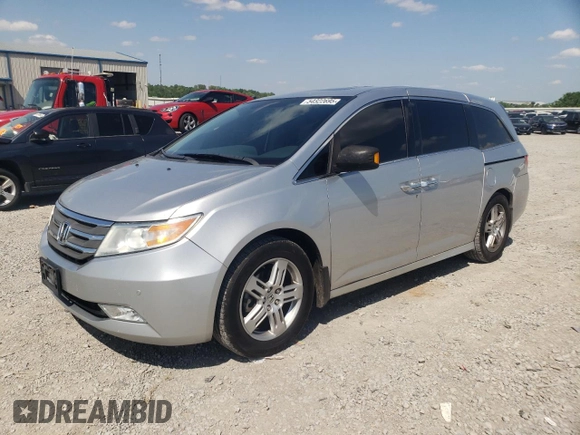 2012 Honda Odyssey Touring with VIN 5FNRL5H94CB009952, listed as a Copart auction lot 54322695 with 135,551 mi miles and Salvage title. Bid and sale history available at DreamBid. Image 1.