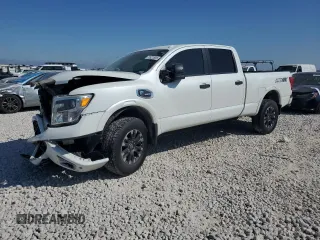 2017 Nissan Titan XD PRO-4X with VIN 1N6BA1F43HN562492, listed as a Copart auction lot 72621804 with 140,562 mi miles and Salvage Title. Bid and sale history available at carsss.com. Image 1.