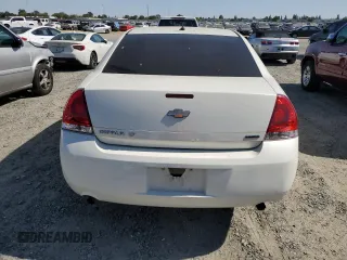 2014 Chevrolet Impala LT with VIN 2G1WB5E39E1167594, listed as a Copart auction lot 55836905 with 136,690 mi miles and Salvage Title. Bid and sale history available at DreamBid. Image 6.