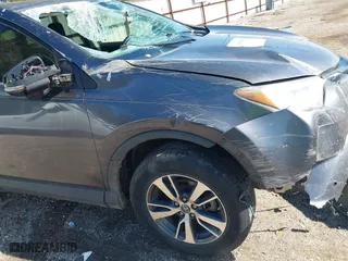 2016 Toyota RAV4 XLE with VIN JTMWFREV4GJ075192, listed as a IAAI auction lot 41395452 with 163,723 mi miles. Bid and sale history available at carsss.com. Image 17.