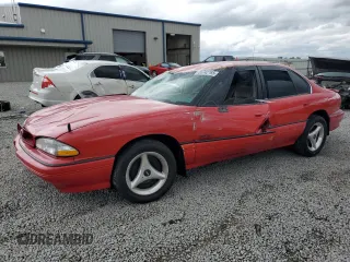 1994 Pontiac Bonneville z VIN 1G2HX52L3R4224473, wystawiony jako Copart lot #55742765 z przebiegiem 145 767 mil mil oraz Szkoda całkowita • Salvage title. Historia ofert i sprzedaży dostępna na DreamBid. Obrazek 1.