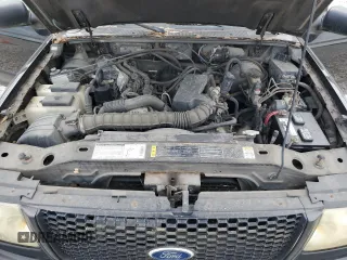 2002 Ford Ranger XL z VIN 1FTYR10U72TA09491, wystawiony jako Copart lot #61440305 z przebiegiem 150 278 mil mil oraz Czysty tytuł • Clean title. Historia ofert i sprzedaży dostępna na DreamBid. Obrazek 11.