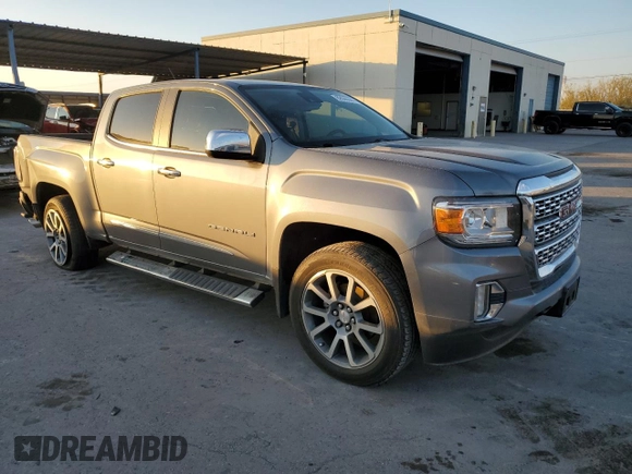 2021 GMC Canyon 4WD Denali with VIN 1GTG6EEN4M1130779, listed as a Copart auction lot 82695044 with 38,662 mi miles and Salvage Title. Bid and sale history available at carsss.com. Image 4.