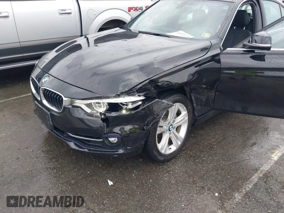 2018 BMW 3 Series 330i xDrive with VIN WBA8D9G50JNU69376, listed as a IAAI auction lot 41971138 with 61,551 mi miles. Bid and sale history available at carsss.com. Image 6.