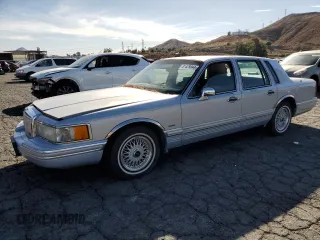 1994 Lincoln Town Car Executive with VIN 1LNLM81W0RY759647, listed as a Copart auction lot 81429844 with Not provided miles and Clean title. Bid and sale history available at DreamBid. Image 1.