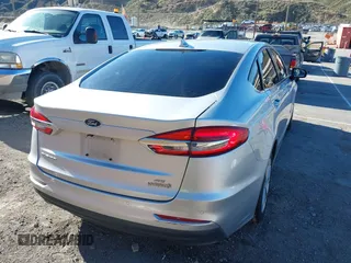 2019 Ford Fusion SE with VIN 3FA6P0LUXKR208139, listed as a IAAI auction lot 41820958 with 66,609 mi miles and . Bid and sale history available at DreamBid. Image 4.