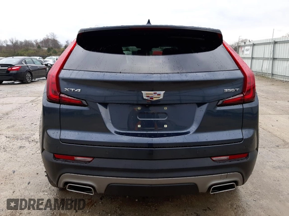 2021 Cadillac XT4 FWD Premium Luxury with VIN 1GYFZCR43MF001003, listed as a Copart auction lot 67527962 with 30,230 mi miles. Bid and sale history available at carsss.com. Image 6.
