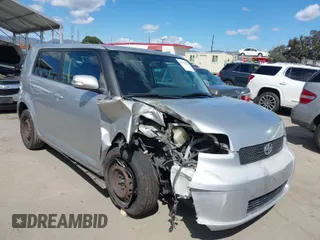 2009 Scion xB with VIN JTLKE50E991081756, listed as a IAAI auction lot 41952232 with 167,079 mi miles. Bid and sale history available at carsss.com. Image 1.