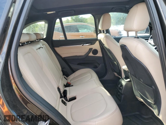 2017 BMW X1 xDrive28i with VIN WBXHT3C32H5F71690, listed as a Copart auction lot 60852375 with 67,475 mi miles and Salvage title. Bid and sale history available at DreamBid. Image 11.