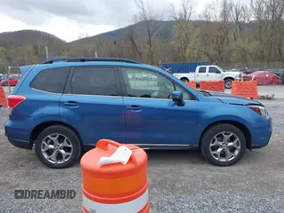 2017 Subaru Forester Touring with VIN JF2SJAWC1HH443799, listed as a IAAI auction lot 41943045 with 122,213 mi miles and . Bid and sale history available at DreamBid. Image 13.