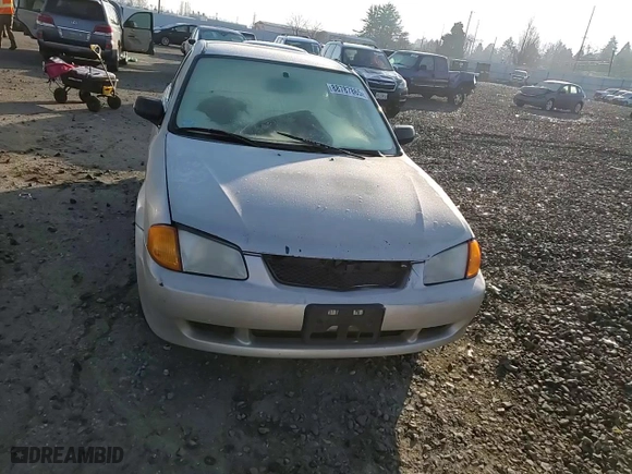 2000 Mazda Protege DX with VIN JM1BJ2225Y0240057, listed as a Copart auction lot 88787865 with 0 mi miles and Salvage Title. Bid and sale history available at carsss.com. Image 11.
