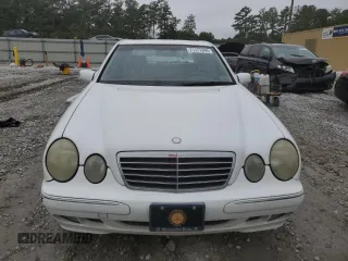 2000 Mercedes-Benz E-Class with VIN WDBJF70J1YB078418, listed as a Copart auction lot 71177244 with 189,838 mi miles and Salvage Title. Bid and sale history available at carsss.com. Image 5.