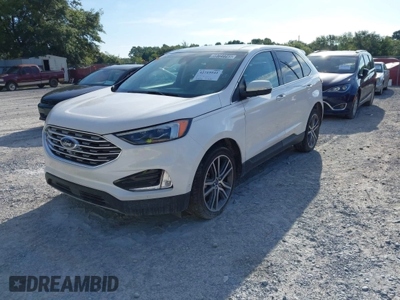 2019 Ford Edge Titanium with VIN 2FMPK3K95KBB34764, listed as a IAAI auction lot 42719541 with 128,028 mi miles and . Bid and sale history available at DreamBid. Image 2.