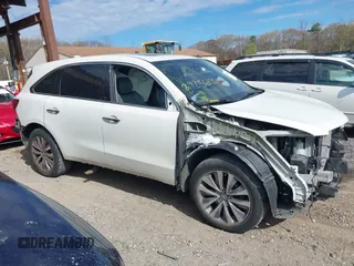 2016 Acura MDX w/Tech with VIN 5FRYD4H43GB014801, listed as a IAAI auction lot 39256120 with 73,769 mi miles. Bid and sale history available at carsss.com. Image 13.
