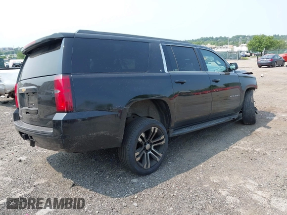 2015 Chevrolet Suburban LT with VIN 1GNSKJKC4FR222178, listed as a IAAI auction lot 42423080 with 234,870 mi miles and . Bid and sale history available at DreamBid. Image 4.