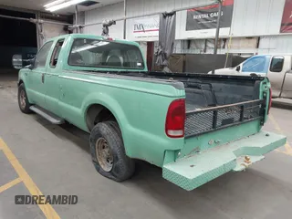 1999 Ford Super Duty F-250 XL with VIN 1FTNX20F9XEA58381, listed as a IAAI auction lot 40625121 with 321,045 mi miles. Bid and sale history available at carsss.com. Image 3.