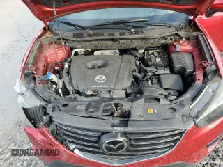 2016 Mazda CX-5 Grand Touring with VIN JM3KE4DY6G0753826, listed as a Copart auction lot 55391555 with 96,852 mi miles and Salvage Title. Bid and sale history available at DreamBid. Image 12.
