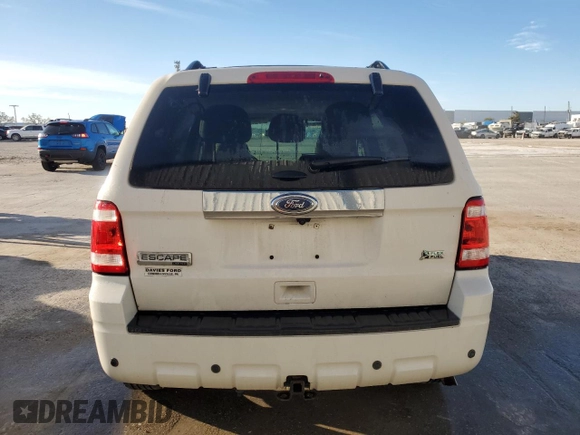2011 Ford Escape Limited with VIN 1FMCU9EG0BKB89084, listed as a Copart auction lot 87066594 with 112,625 mi miles and Salvage Title. Bid and sale history available at DreamBid. Image 6.
