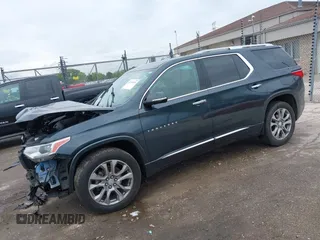 2018 Chevrolet Traverse Premier z VIN 1GNEVJKW4JJ240024, wystawiony jako IAAI lot #42369659 z przebiegiem 160 147 mil mil oraz . Historia ofert i sprzedaży dostępna na DreamBid. Obrazek 18.