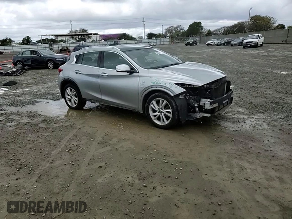 2018 Infiniti QX30 Premium with VIN SJKCH5CP0JA048053, listed as a Copart auction lot 48202385 with 90,578 mi miles and Salvage title. Bid and sale history available at DreamBid. Image 12.