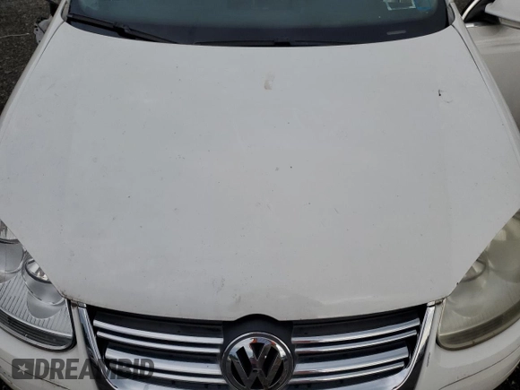 2009 Volkswagen Jetta SE with VIN 3VWRZ71K69M120110, listed as a Copart auction lot 64813905 with 114,552 mi miles and Salvage title. Bid and sale history available at DreamBid. Image 11.