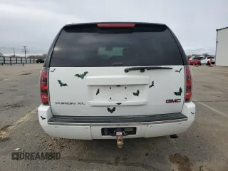2008 GMC Yukon XL z VIN 1GKFK66858J243561, wystawiony jako Copart lot #50010235 z przebiegiem 152 837 mil mil oraz Szkoda całkowita • Salvage title. Historia ofert i sprzedaży dostępna na DreamBid. Obrazek 6.