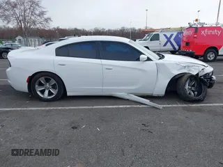 2015 Dodge Charger SE z VIN 2C3CDXBG6FH874656, wystawiony jako IAAI lot #41886805 z przebiegiem 121 568 mil mil oraz . Historia ofert i sprzedaży dostępna na DreamBid. Obrazek 13.