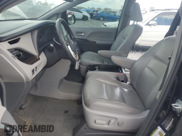 2015 Toyota Sienna XLE with VIN 5TDYK3DC2FS532715, listed as a Copart auction lot 62298295 with 151,583 mi miles and Salvage title. Bid and sale history available at DreamBid. Image 7.