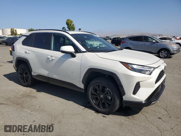 2022 Toyota RAV4 Hybrid SE with VIN 2T3T6RFV8NW034399, listed as a Copart auction lot 60249015 with 39,495 mi miles and Salvage title. Bid and sale history available at DreamBid. Image 4.